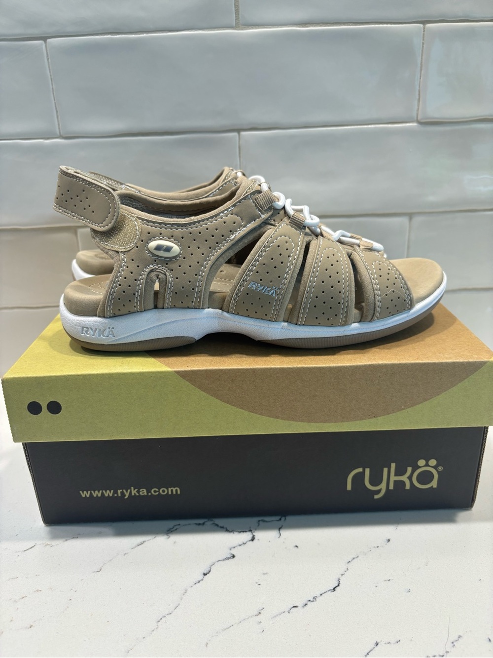 Ryka adjustable nylon sport sandals in a tan color. Size 6
